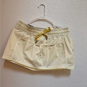 Lululemon Athletica Cream Skort with Yellow Tie